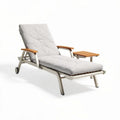 Wooden chaise lounge with black cushion for outdoor relaxation 190 x 70 x 30cm